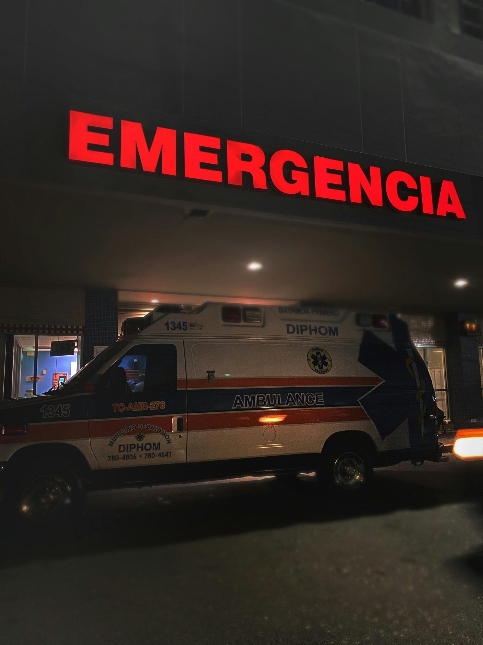 white and red ambulance van emergency movers