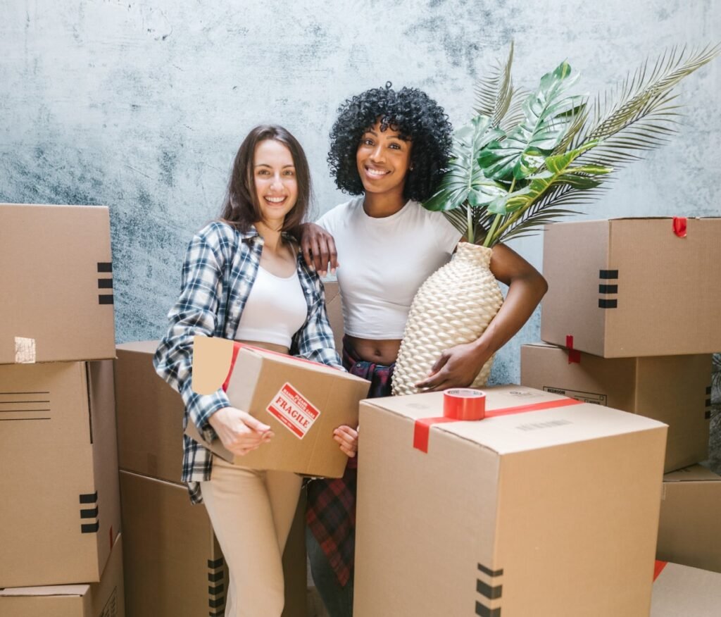Two women with moving boxes in Nashville TN.