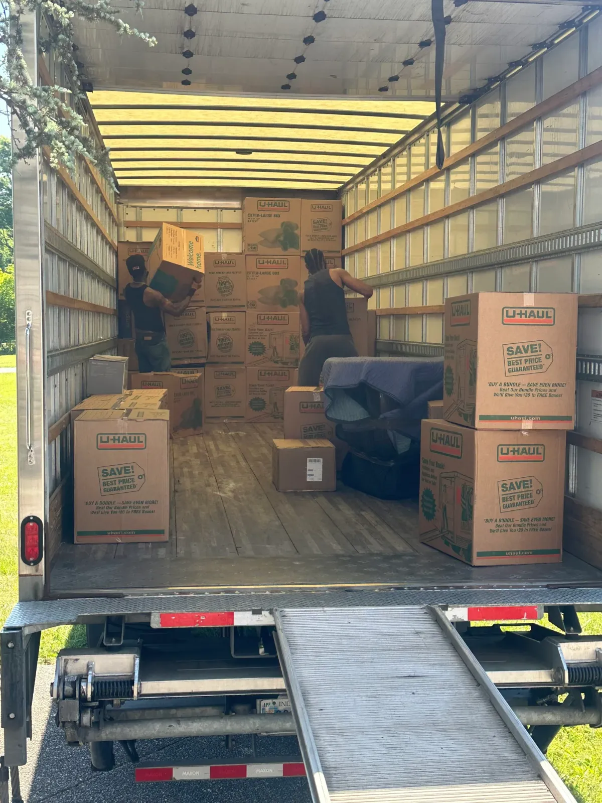 Moving crew loading boxes into a truck on a Nashville move