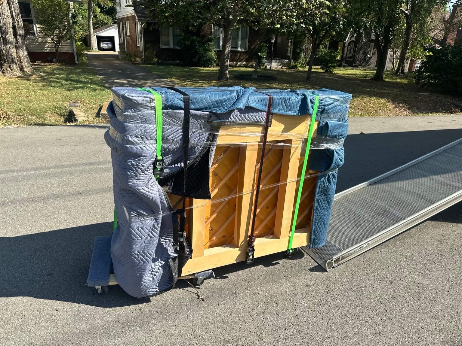 Back of upright piano protected by JM Moving Nashville