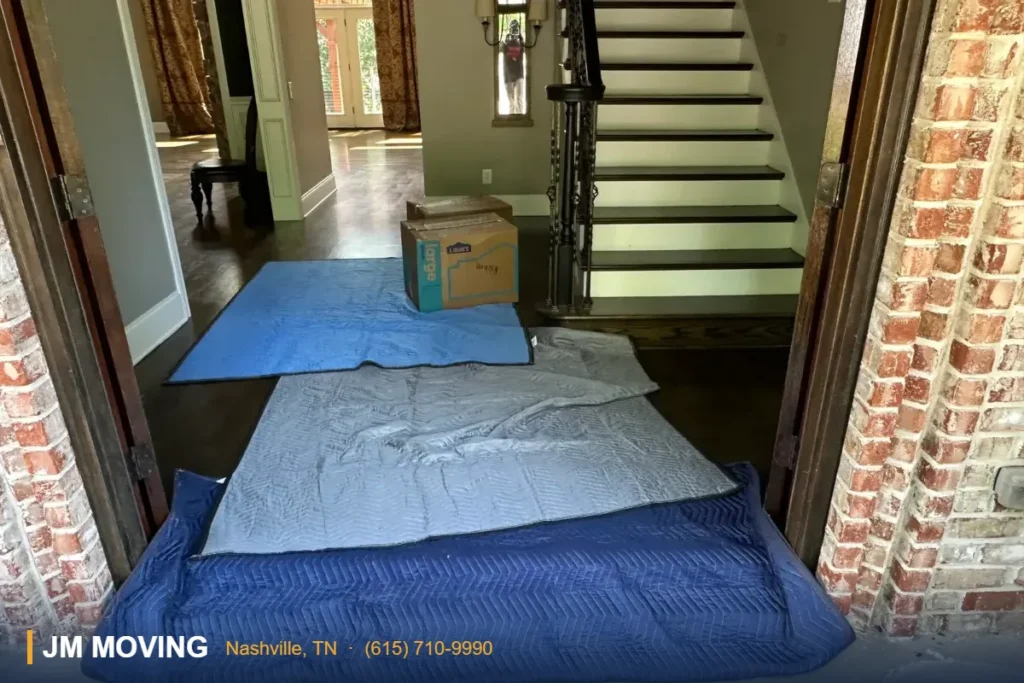 JM Moving furniture padding and floor protection in a Nashville home