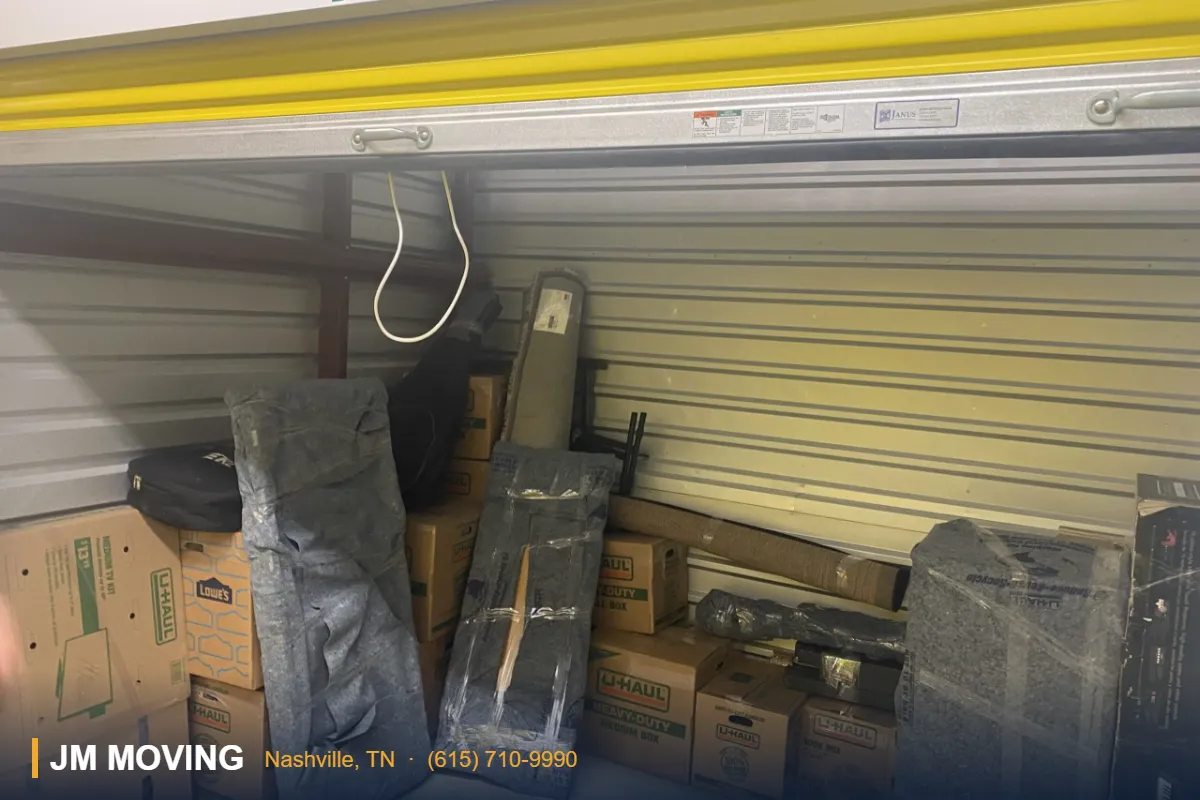 JM Moving's Nashville movers at work for a family comparing storage facilities close to me